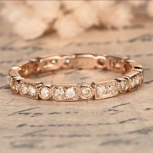 Art Deco style 14k rose gold and diamond band